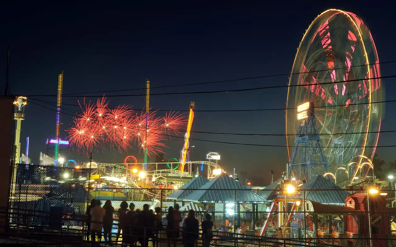 Picture of the vibrant Coney Island with its iconic amusement park attractions and bustling boardwalk.