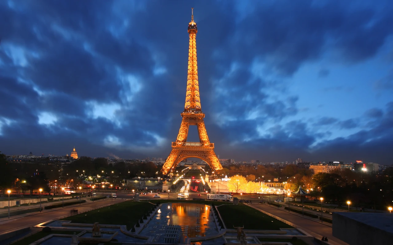 Majestic Eiffel Tower in Paris, France during the daytime with a blue sky backdrop