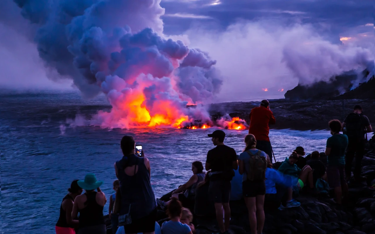 Scenic view of Hawaii Volcanoes National Park with lush greenery, steaming vents, and volcanic landscape