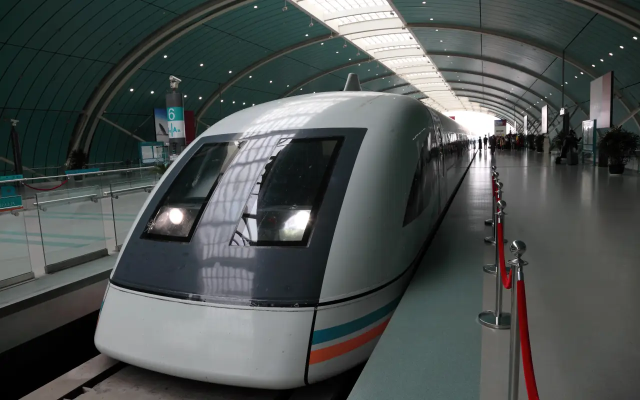 High-speed train waiting at a modern station