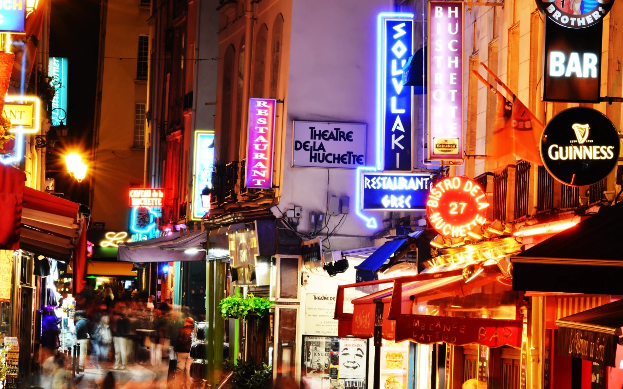 A scenic view of the historic Latin Quarter in Paris, showcasing its charming streets and vibrant atmosphere