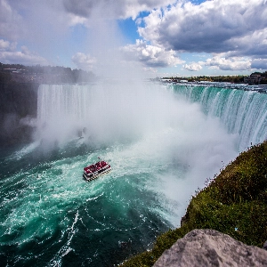 Majestic Niagara Falls with powerful cascading waters and misty atmosphere