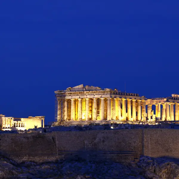 The Acropolis in Athens, Greece - a UNESCO World Heritage Site featuring ancient ruins and monuments such as the Parthenon and the Propylaea.